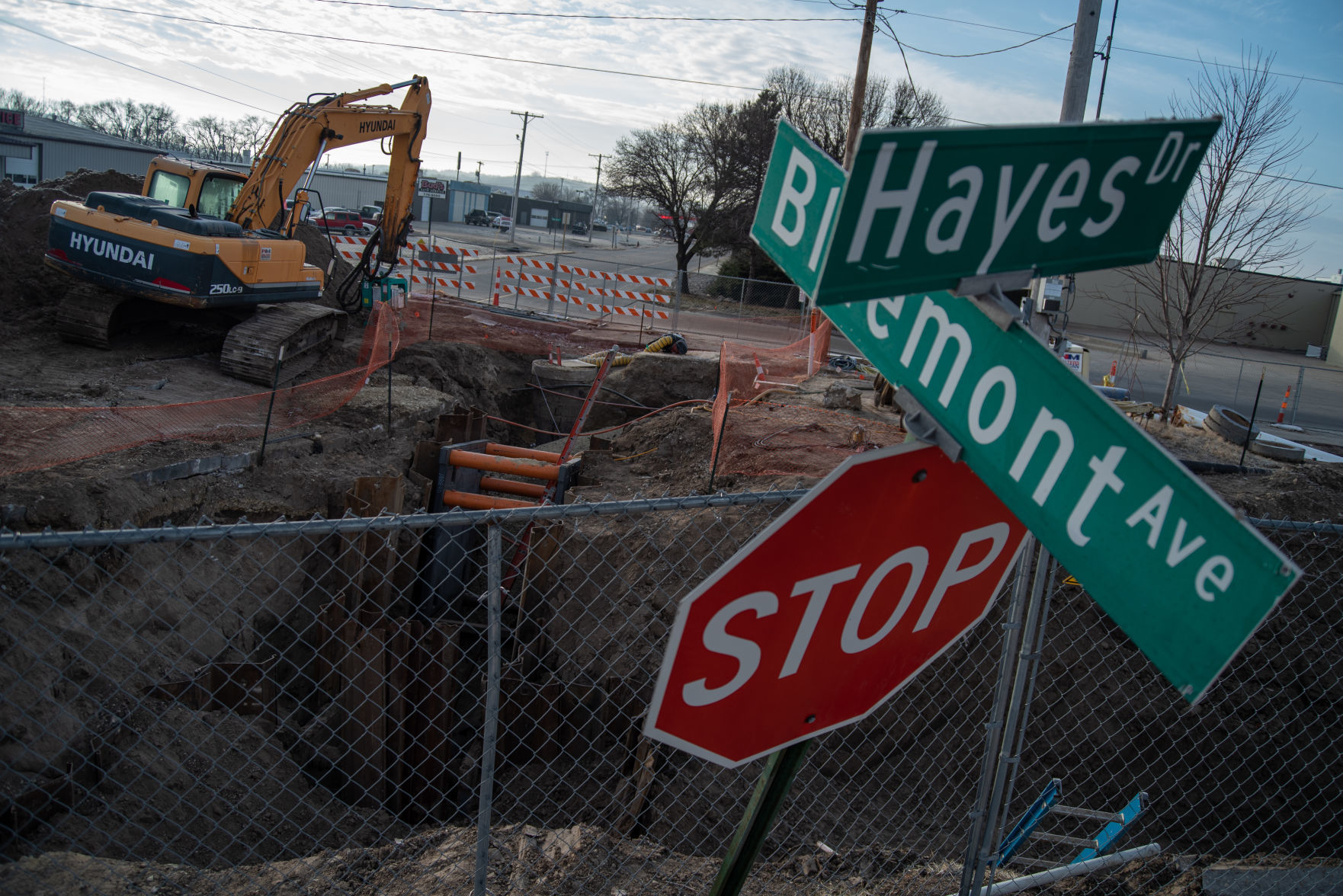 The sinkhole near Walmart parking lot is seen under construction on Friday, December 27.